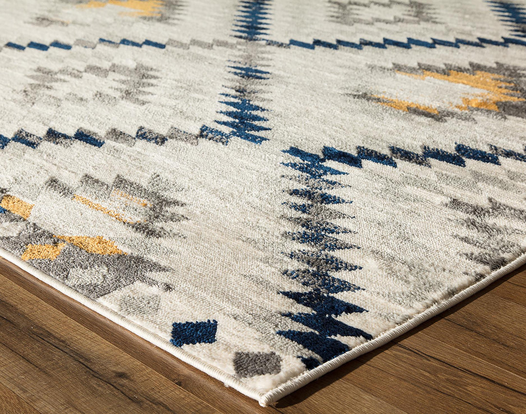 Gold patterns on ivory area rug -  Ivory  -  5'3"x7'0"
