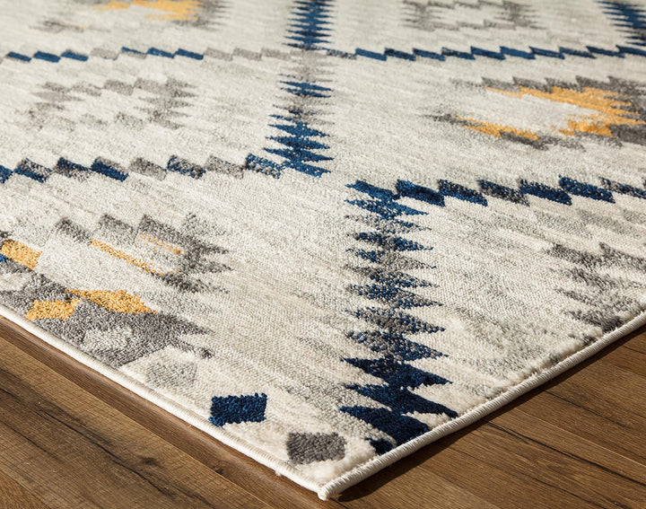 Gold patterns on ivory area rug -  Ivory  -  5'3"x7'0"