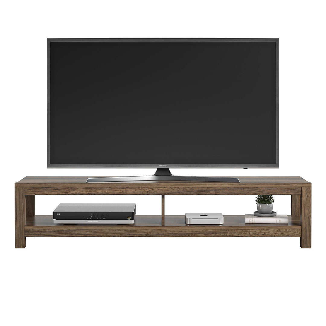 Maximize your viewing experience with the Essentials 65 TV stand - Florence Walnut